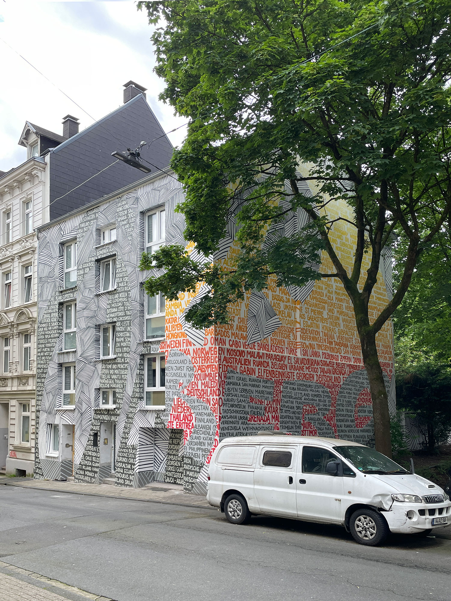 Ölberg Peace Mural facade in Wuppertal by BRAND Urban Art